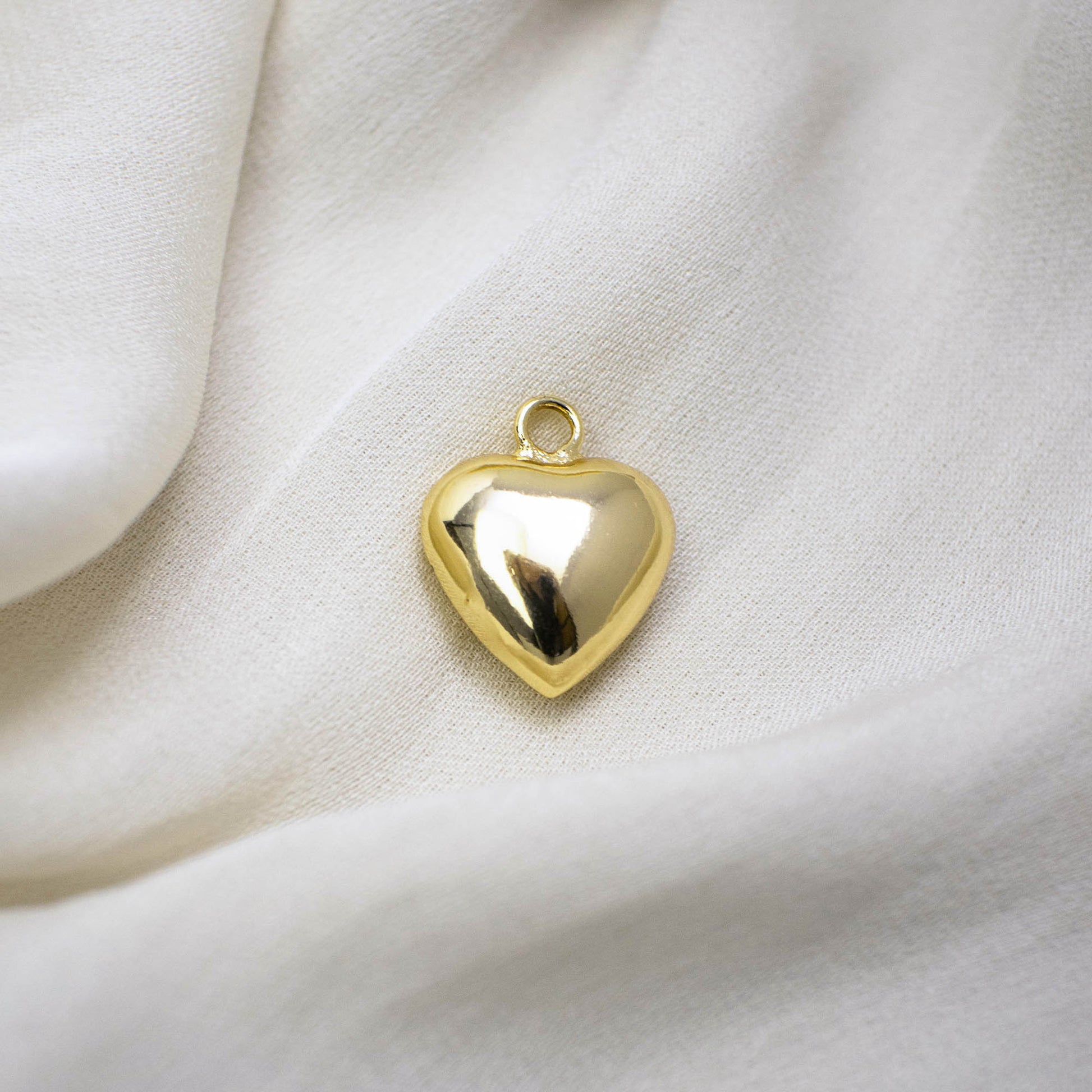 This photo features with a hollow heart-shaped pendant.