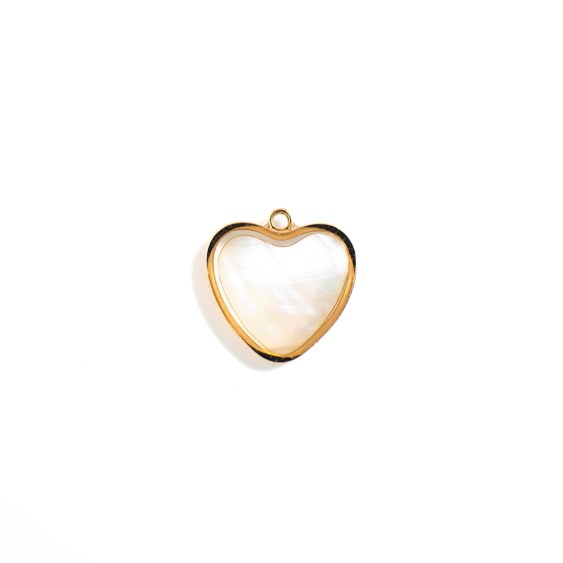 This photo features with a heart-shaped pendant made of pearl paper.