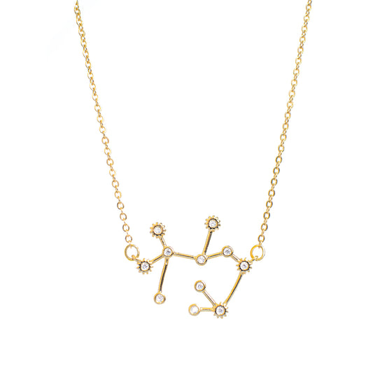 This photo features a thin chain necklace made of 14K gold-plated sterling silver, paired with a zodiac constellation pendant.